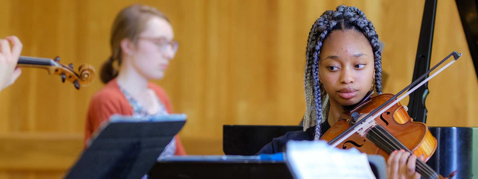student musician rehearsing