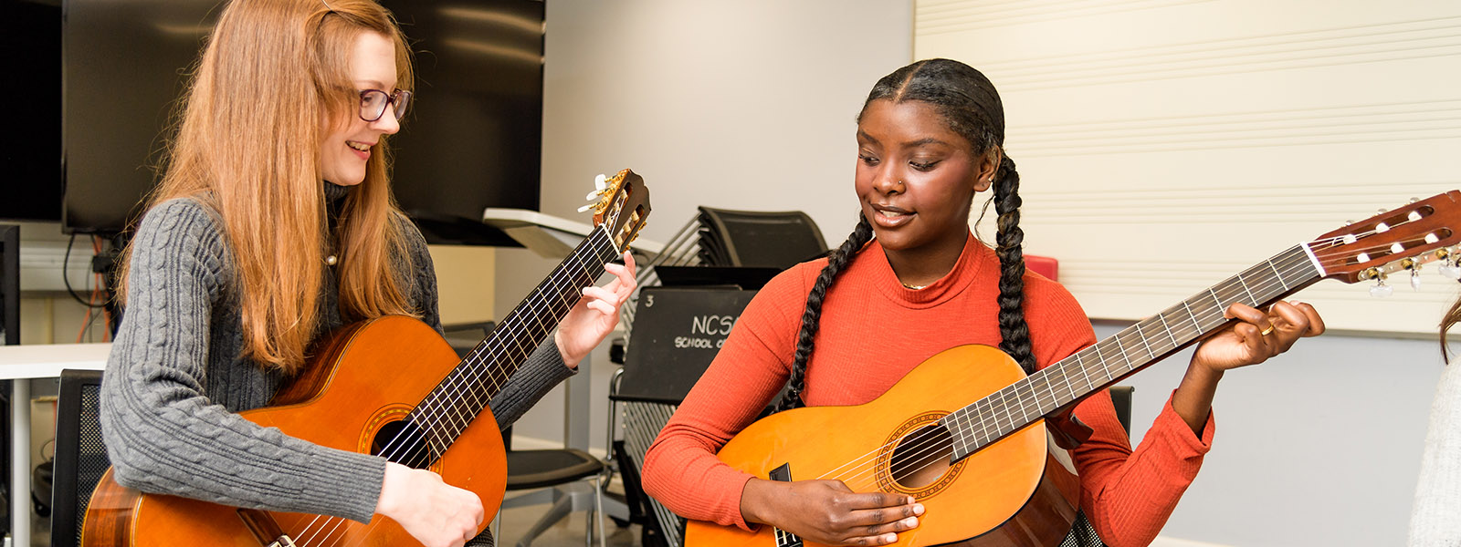 Teen guitar class