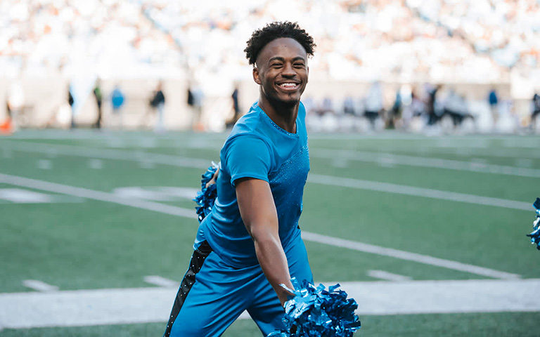 Tre Booker performing with the TopCats