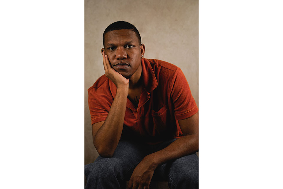 Lawrence Davis headshot, seated