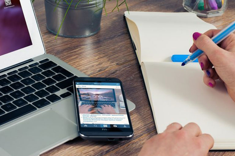 Person writing with marker