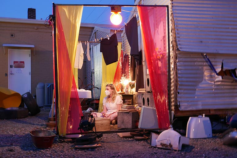 Actor in an individual "pod" for Love and Depositions