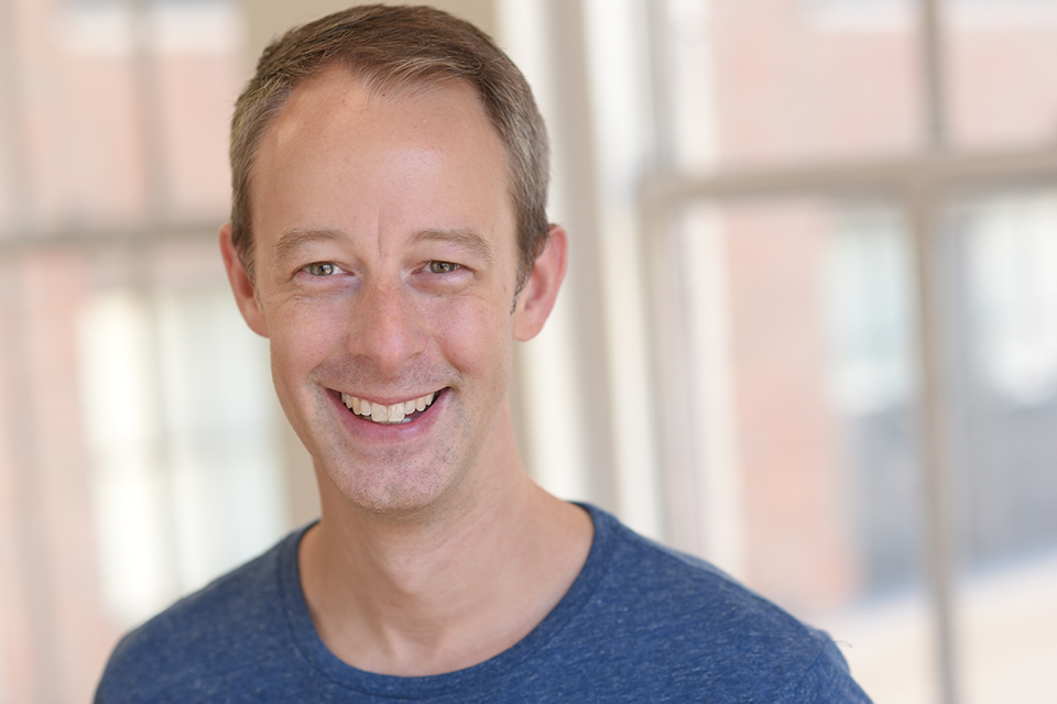 A man smiling at the camera